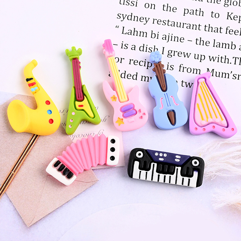10 قطع من الراتنج الكرتوني الل - مراجعة Musical Instrument Jewelry وسعره