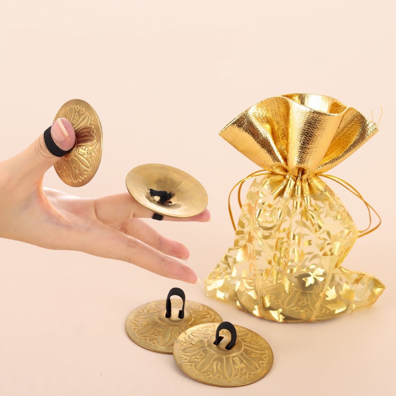 قطعتان من صنوج الأصابع النحاسي - مراجعة Musical Instrument Zills وسعره