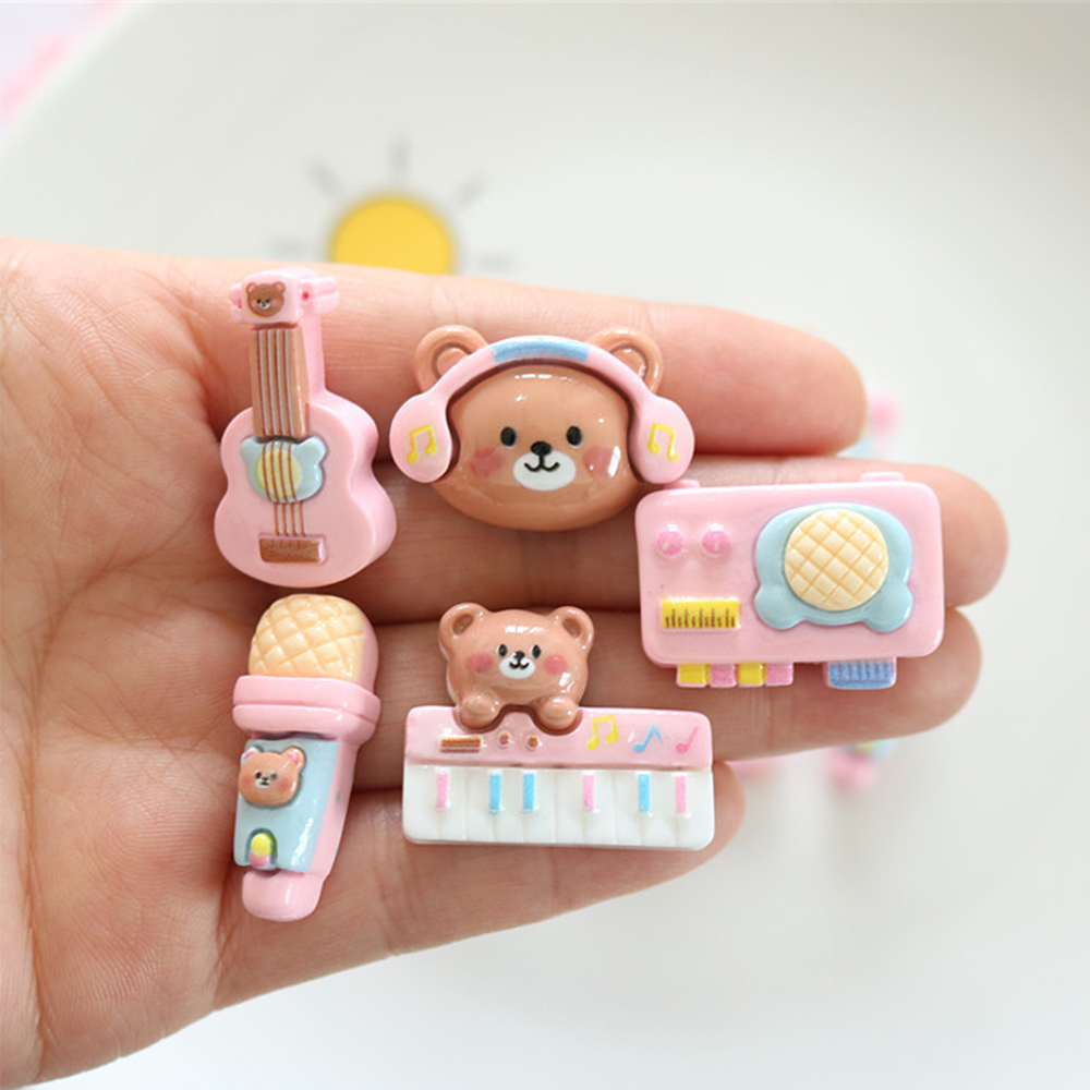 كبوشون بظهر مسطح من الراتينج ل - مراجعة Musical Instrument Jewelry وسعره