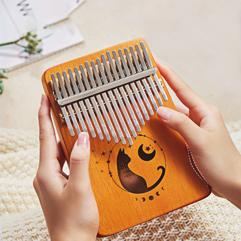 17 مفتاح كاليمبا متدرج اللون ت - مراجعة Musical Instrument Book وسعره
